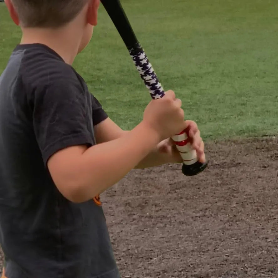 child holding bat - bat grip
